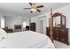 Bedroom showcasing a bed and fireplace, with ample natural light at 6638 Dazzling Heights Ln, Las Vegas, NV 89110