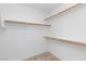 Walk-in closet featuring built-in shelving and ample storage space at 6638 Dazzling Heights Ln, Las Vegas, NV 89110
