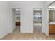 Hallway featuring doorways to a bedroom, bathroom, and other rooms at 6638 Dazzling Heights Ln, Las Vegas, NV 89110