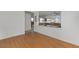 Spacious living room with hardwood floors, ceiling fan and an open layout at 6638 Dazzling Heights Ln, Las Vegas, NV 89110