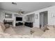 Comfortable living room features a fireplace, ceiling fan, and open layout perfect for entertaining at 6638 Dazzling Heights Ln, Las Vegas, NV 89110