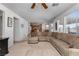 Open concept living room with hardwood floors, recessed lighting, and plenty of natural light at 6638 Dazzling Heights Ln, Las Vegas, NV 89110
