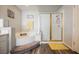 Bathroom with a large tub and glass shower at 664 Mystic Cliffs Ave, Las Vegas, NV 89183