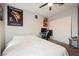 Bright bedroom with a ceiling fan, featuring playful posters and a dedicated workspace for work or study at 664 Mystic Cliffs Ave, Las Vegas, NV 89183