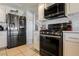 Well-equipped kitchen with stainless steel appliances and ample countertop space at 664 Mystic Cliffs Ave, Las Vegas, NV 89183