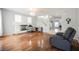 Inviting living room features hardwood floors and decorative fireplace at 664 Mystic Cliffs Ave, Las Vegas, NV 89183