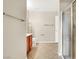 Bathroom featuring a glass shower, tile flooring, vanity and towel rack at 6680 Caporetto Ln # 103, North Las Vegas, NV 89084