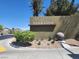 Terrasini community entrance sign with lush landscaping, promoting a welcoming and well-maintained neighborhood at 6680 Caporetto Ln # 103, North Las Vegas, NV 89084