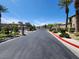 Gated entrance of a community with well-manicured landscaping, ensuring security and privacy for residents at 6680 Caporetto Ln # 103, North Las Vegas, NV 89084