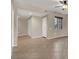 Bright living room featuring neutral paint, tile flooring and a ceiling fan at 6680 Caporetto Ln # 103, North Las Vegas, NV 89084
