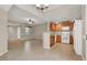 Open-concept living area next to the kitchen, featuring tile flooring at 6680 Caporetto Ln # 103, North Las Vegas, NV 89084