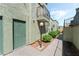 Exterior angle of building, showing front door and walkway at 7084 Burcot Ave # D27, Las Vegas, NV 89156