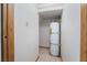 Water heater in a utility closet with tile flooring at 7084 Burcot Ave # D27, Las Vegas, NV 89156