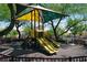 Fun community playground featuring slides and shaded areas, perfect for children to play at 7653 Fabled Filigree St, Las Vegas, NV 89149