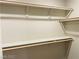 A walk-in closet offers multiple shelving units and rods for organization at 7892 W Shelbourne Ave, Las Vegas, NV 89113