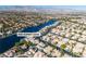Scenic community aerial showing beautiful waterfront homes, streets, and attractive surroundings at 8125 Sunset Cove Dr, Las Vegas, NV 89128