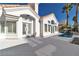 Home exterior featuring white stucco, red tile roof, and a swimming pool at 8125 Sunset Cove Dr, Las Vegas, NV 89128