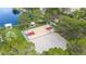 Aerial view of basketball court near lake with trees and nearby seating area at 8125 Sunset Cove Dr, Las Vegas, NV 89128