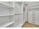 Well-organized walk-in closet with ample shelving and drawer space for storage at 8125 Sunset Cove Dr, Las Vegas, NV 89128