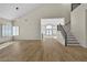 Open floor plan living room with high ceilings and wood flooring at 8125 Sunset Cove Dr, Las Vegas, NV 89128