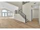 Light-filled living room with wood floors and high ceilings at 8125 Sunset Cove Dr, Las Vegas, NV 89128