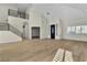 Large living room featuring a staircase, and modern lighting at 8125 Sunset Cove Dr, Las Vegas, NV 89128