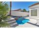 Backyard pool and patio with a spa and multiple levels for seating at 8125 Sunset Cove Dr, Las Vegas, NV 89128