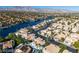 Beautiful homes on waterfront, showcasing lovely houses, palm trees, and serene waterways at 8125 Sunset Cove Dr, Las Vegas, NV 89128