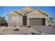 Charming single-story home with stone accents, desert landscaping, and attached two-car garage at 85 Sonata Dawn Ave, Henderson, NV 89011