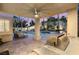 Inviting outdoor covered patio, pool, and waterfall spa, perfect for relaxing and entertaining with its outdoor kitchen at 8801 Rozetta Ct, Las Vegas, NV 89134