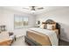 Cozy bedroom with window shutters and a ceiling fan at 8801 Rozetta Ct, Las Vegas, NV 89134