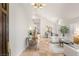 Bright and airy foyer with high ceilings, tiled floors, and elegant furnishings at 8801 Rozetta Ct, Las Vegas, NV 89134