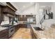 The gourmet kitchen features stainless steel appliances and granite countertops at 8801 Rozetta Ct, Las Vegas, NV 89134