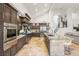 A stylish kitchen featuring granite countertops, stainless steel appliances, and custom cabinets at 8801 Rozetta Ct, Las Vegas, NV 89134