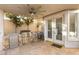 Covered outdoor kitchen with built-in grill, refrigerator, and sink, perfect for entertaining at 8801 Rozetta Ct, Las Vegas, NV 89134