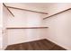 Walk-in closet with carpet and wooden shelving at 9044 Crimson Clover Way, Las Vegas, NV 89134