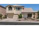Charming two-story home featuring a tile roof, attached two-car garage, and well-maintained front yard at 9044 Crimson Clover Way, Las Vegas, NV 89134