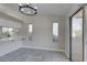Bright kitchen features tile flooring, modern light fixture, and stainless steel appliances at 9436 Mount Cash Ave # 101, Las Vegas, NV 89129