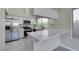 Modern kitchen featuring stainless steel appliances, marble countertops, and ample storage at 9436 Mount Cash Ave # 101, Las Vegas, NV 89129