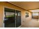 Outdoor patio area with tiled flooring and sliding glass doors offering a private retreat at 9436 Mount Cash Ave # 101, Las Vegas, NV 89129