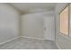 Room with tile floors, neutral walls, and one window at 9436 Mount Cash Ave # 101, Las Vegas, NV 89129