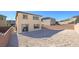 Spacious backyard with a block wall and a view of the mountains at 100 Via Franello, Henderson, NV 89011