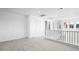 Upstairs landing with neutral carpet, with a view of the mountains at 100 Via Franello, Henderson, NV 89011
