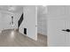Bright entryway features a staircase and pantry with wire shelving at 375 Elks Peak Ave, North Las Vegas, NV 89084
