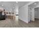 Bright living room flows into a modern kitchen with a center island at 375 Elks Peak Ave, North Las Vegas, NV 89084