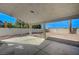 The covered back patio looks out to the mountains in the distance at 4010 Herblinda Ln, North Las Vegas, NV 89032