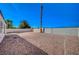 Backyard featuring rock landscaping, block wall fencing, and ample space for personalization and landscaping at 4010 Herblinda Ln, North Las Vegas, NV 89032