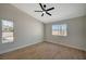 Bright bedroom with vaulted ceiling, wood floors, modern ceiling fan and natural light at 4010 Herblinda Ln, North Las Vegas, NV 89032
