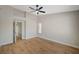 Bedroom with wood flooring and neutral paint at 4010 Herblinda Ln, North Las Vegas, NV 89032