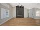 Living area with a dark fireplace and lots of light at 4010 Herblinda Ln, North Las Vegas, NV 89032